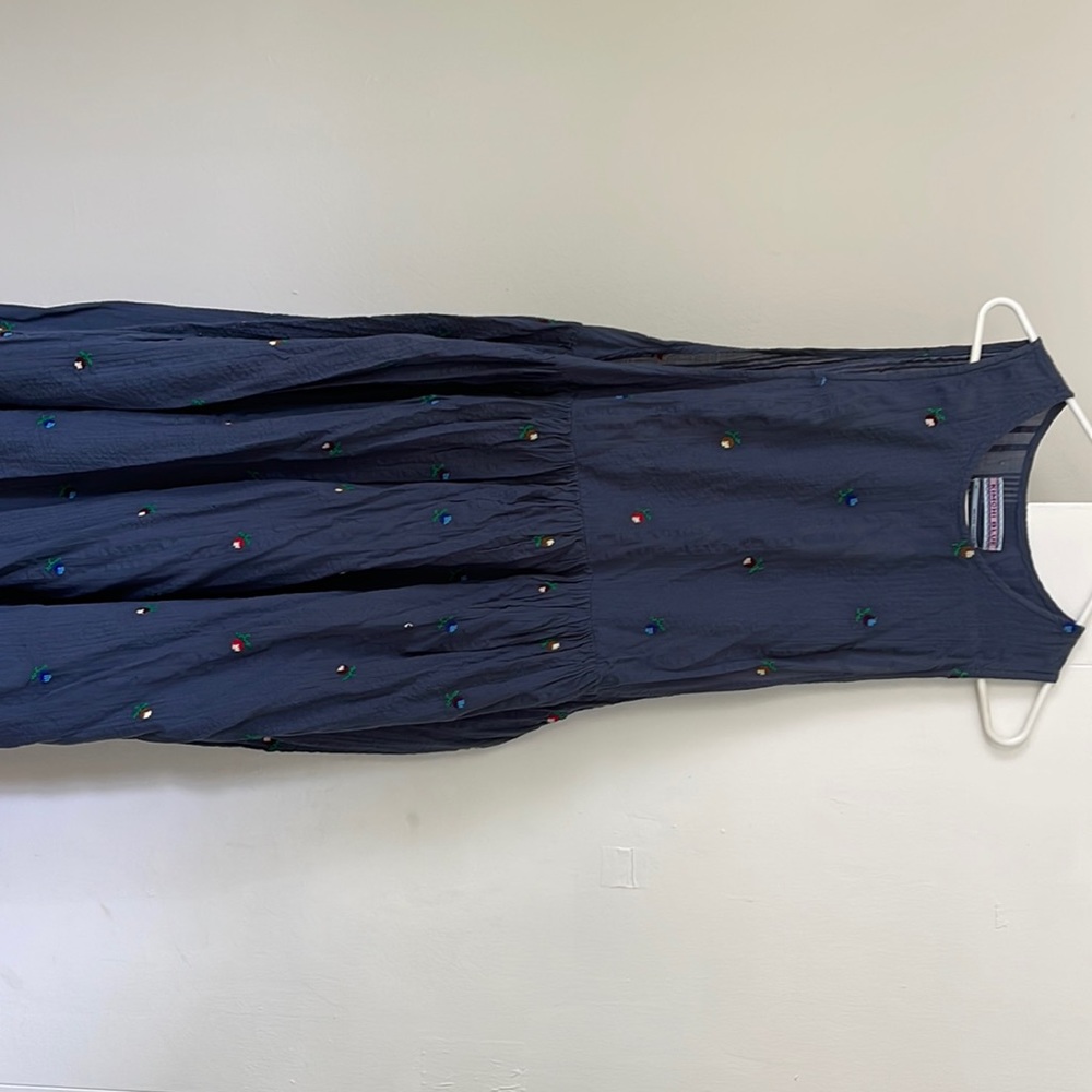 Open side midi dress or top. The sides have ties to keep it together